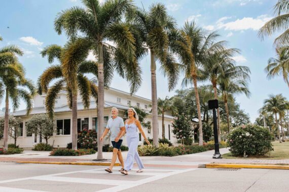 couple walking in downtown naples florida