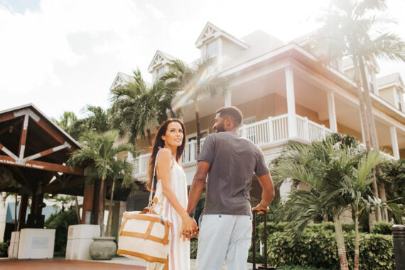 couple with travel bags