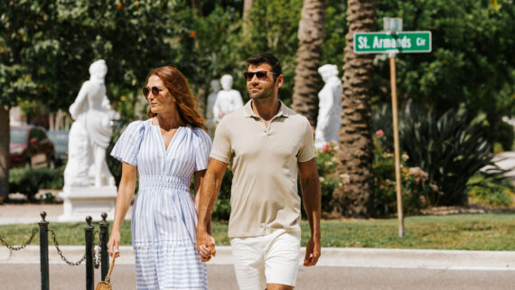 A couple strolls along St. Armands Circle.