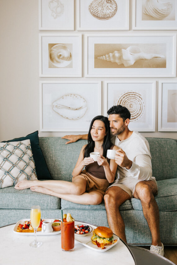 couple eating breakfast in their suite